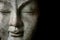 Close up Buddah statue with black copyspace