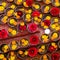 Close-up on Buddhist flower offerings in bowls.