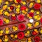 Close-up on Buddhist flower offerings in bowls.