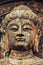 Close-up of Buddhist Statue of Longmen Grottoes in Luoyang, Chin