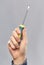 Close up of builder`s hand holding screwdriver