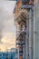 Close up of building at a power plant in Utah Valley with cloudy sky background