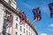 Close up of building on Regent Street London with row of British flags to celebrate the wedding of Prince Harry to Meghan Markle