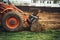 Close up of bulldozer scoop moving earth and doing landscaping works