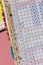 Close-up of Bullet Journal-style notebook labels with daily task follow-ups in colored grids. Habbit Tracker in Spanish