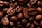 a close up of a bunch of coffee beans