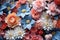 A close up of a bunch flowers. Pink and red tones flower pattern background