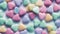 a close up of a bunch of hearts on a white surface with a blue sky in the background and a few pink, blue, yellow, green, and