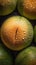 a close up of a bunch of limes with water droplets on them and a knife sticking out of the top of one of them