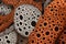 A close up of a bunch of orange and black circles, AI