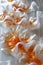 A close up of a bunch of white and orange flowers, AI
