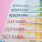 close up bundle of money Euros banknotes on the color background, business, finance, saving, banking concept