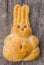 Close up of Bunny Bread shape on wood background