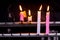 close up burn pink and white candle to offering / sacrificial /