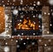 Close up of burning fireplace with snow