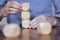 Close up of a business person arranging large wooden blocks. Business strategy and solutions