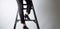 Close up of a business woman climbing a step ladder. Career growth and development. Generative ai