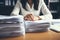 Close-Up of business Woman Organizing Documents, signing contracts