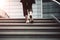 Close-Up of Business Woman\\\'s Feet Climbing Stairs to Achieve Goals. created with Generative AI