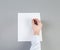 Close up of businessman\'s hand intending to write a document, petition or claim.