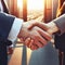 Close up businesspeople shaking hands during a meeting. Handshake deal business corporate