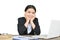 Close up of businesswomen writing on paper sheet in office