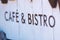Close up on Cafe Bistro street sign