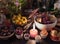 Close up of candle, herbs, flowers and berries