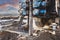 Close-up of a car-based drilling rig at a construction site. Drilling deep wells for mining.. Working process of drilling a well