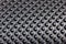 Close up of Car mat - Black carpet, synthetic fabrics Rugs background