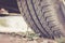 Close up of car tyre in the desert, safari