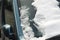 Close-up of a car windscreen covered in snow.