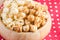 Close up, Caramel popcorn in wood bowl.