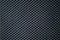 Close up of carbon fiber textile texture. Very strong fabric background