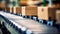 Close-up of cardboard boxes on conveyor belt in warehouse