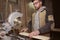 Close-up of a carpenter doing woodwork. a small business owner was cutting a wooden Board with a circular saw in a workshop