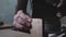 Close-up, a carpenter sawing a wooden board with a hand saw. woodworker makes a dovetail on a wooden detail.4k. 4k video. Slow