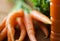 Close up of carrot bunch on wooden table