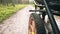 Close-up of a cart wheel on a forest road, on an open road without people