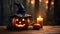 Close up of a carved and glowing Pumpkin with a Witch Hat on a wooden Table standing beside a Candle. Scary Halloween Backdrop.