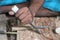 Close up of carving gouge chisel designing a wooden plank