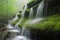 close-up of cascading spring waterfalls, with droplets of water and mist visible