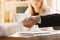 Close up of caucasian human hands, shaking, working in office, business, people