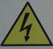 close-up: caution risk of electric shosk sign with black lightning