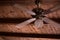 Close Up of Ceiling Fan Hanged on Wooden Canopy Spinning