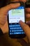 Close Up of Cellular Phone Text Messages About Travel