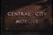 Close-up of Central City Morgue plaque fading into Autopsy Room sign