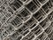 close up chain link fence stacked industrial security fencing rolled for sale
