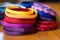 a close up of charity wristbands in assorted colors