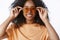 Close-up charming smiling african american girl afro hairstyle checking sunglasses bying new pair glasses get ready